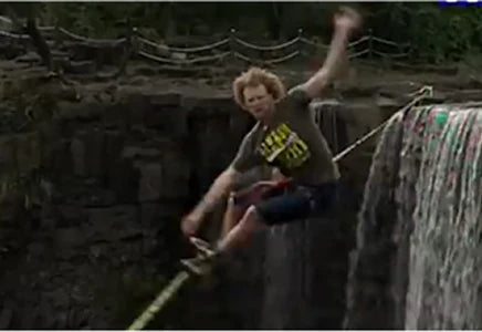 Andy Lewis on a slackline above a waterfall (mobile)